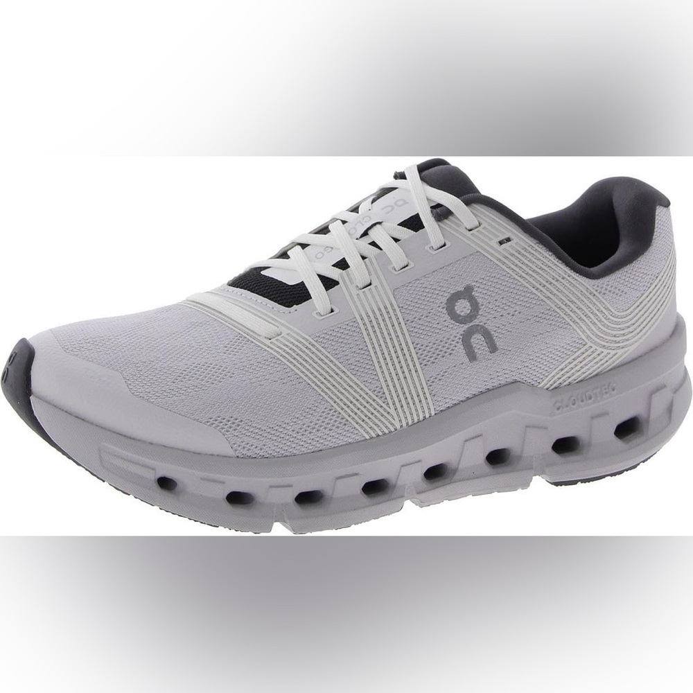 On Running Women’s White and Black Athletic Shoes